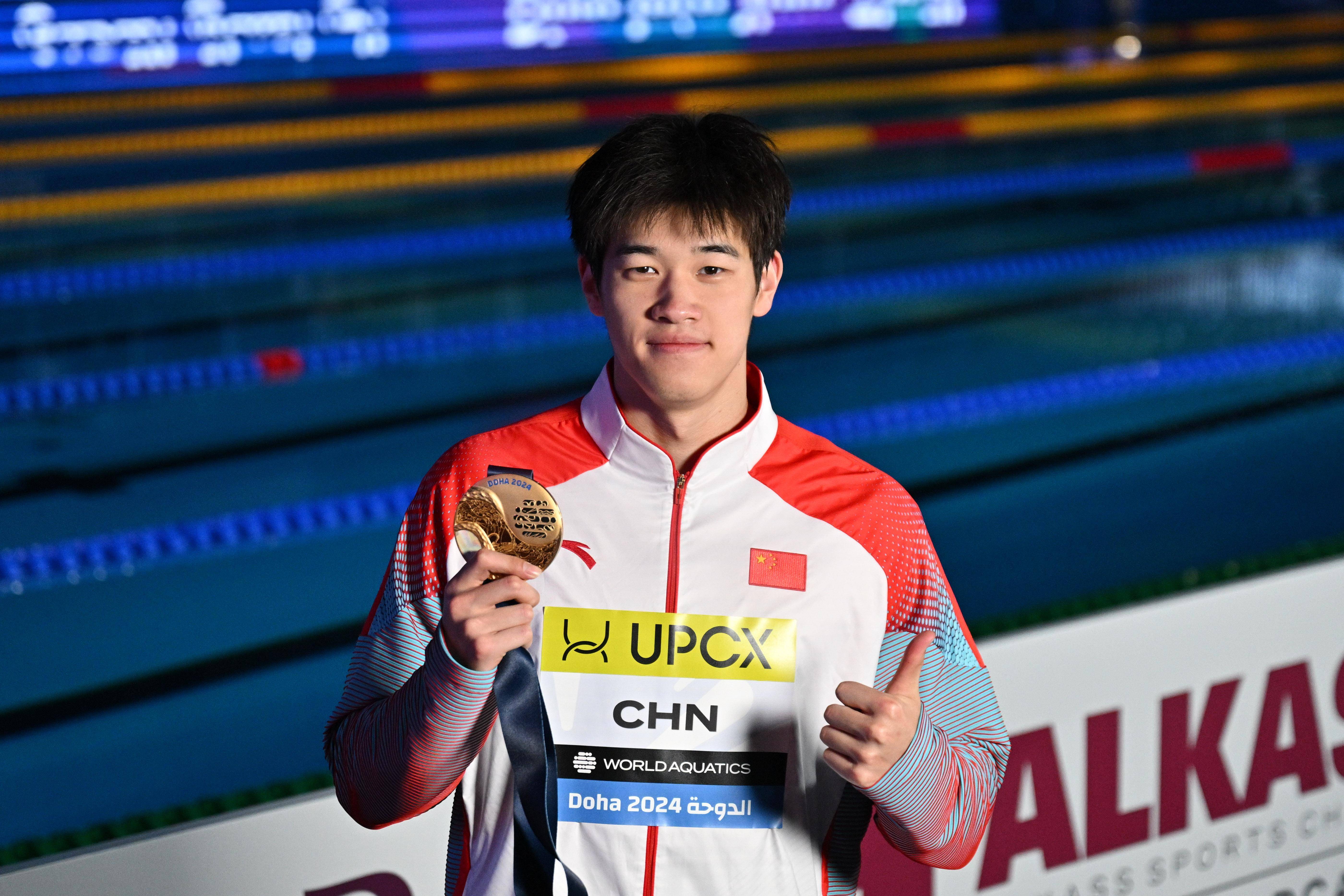 游泳世锦赛：中国队夺得男子4X100米自由泳接力冠军
